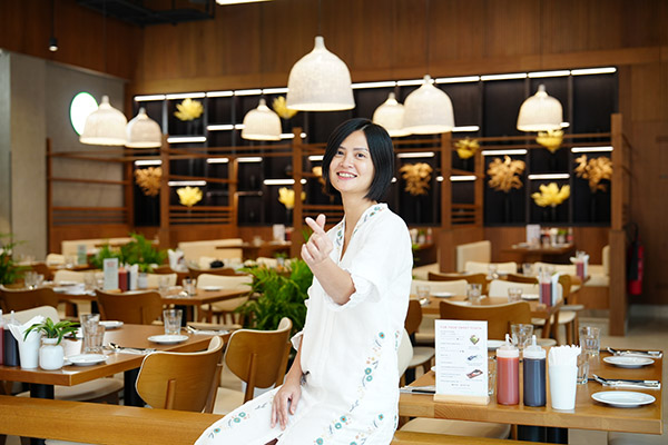 chef lily poses in vietnamese foodies restaurant